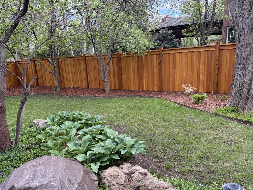 Cedar fence along driveway