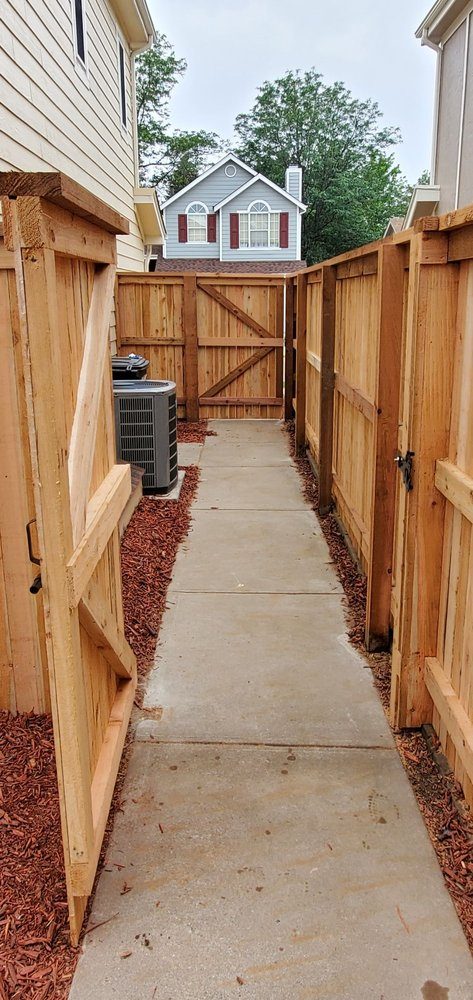 Cedar fence along a pathway